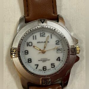 Milan:vintage men’s luminous hands Japan movement water resistant wrist watch.